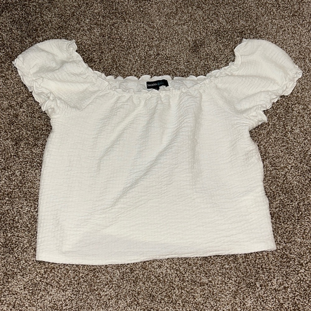 size large in youth, could fit xs in women’s, white ruffled crop shirt